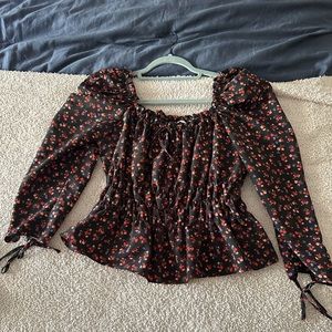 Topshop puff sleeve black blouse! Can wear off the shoulder too